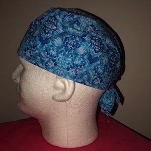 Tie back style surgical cap